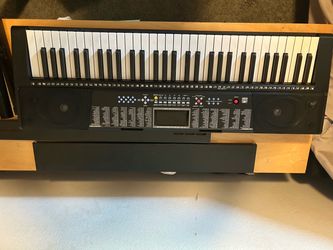 Electric Piano (comes free with stand and adjustable Stool”