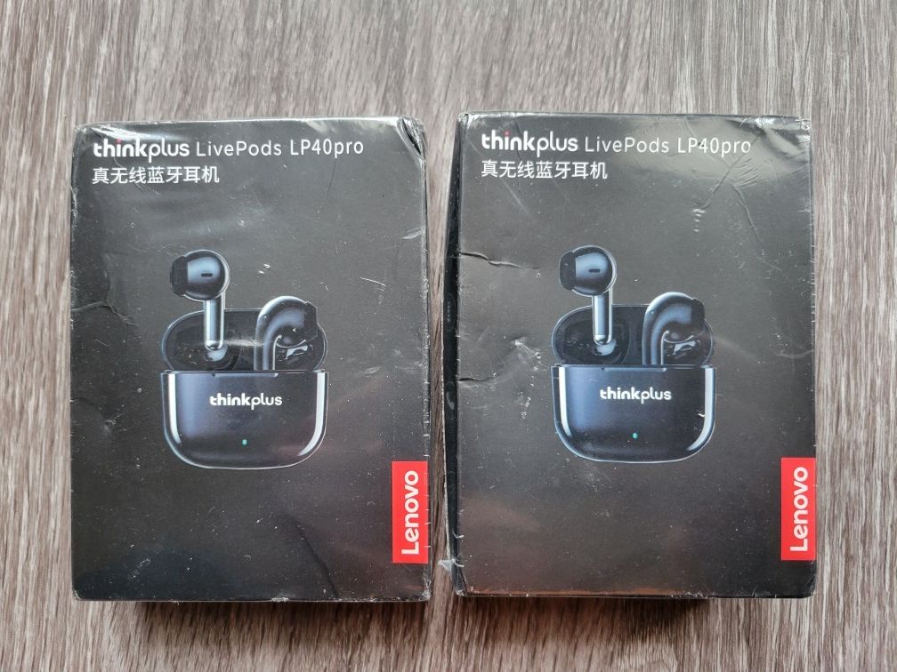 2 Lenovo thinkplus LP40 Pro Wireless Earbuds .