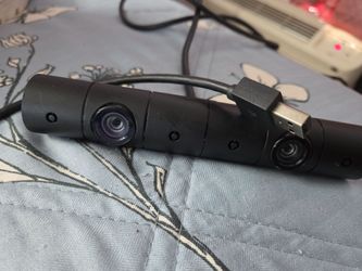 Sony PlayStation 4 Camera (Version 2), model CUH-ZEY2. This cylindrical