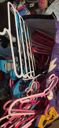 Bag of mostly pink kid hangers