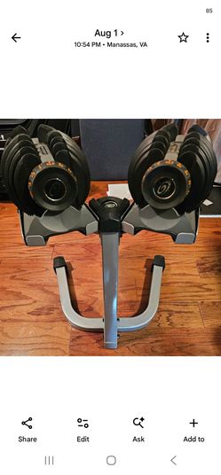 Nautilus adjustable 5 to 52.5 pound dumbells with stand.