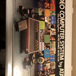 Atari With Games And Box