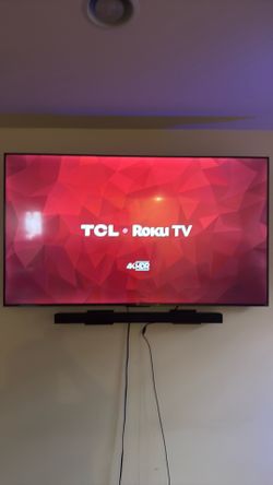 65” TCL TV with Samsung soundbar and wireless subwoofer