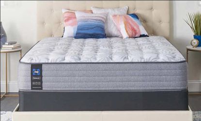 Brand New Queen size bed plastic still on the matress with base
