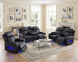 New blackish gray power reclining sofa and loveseat