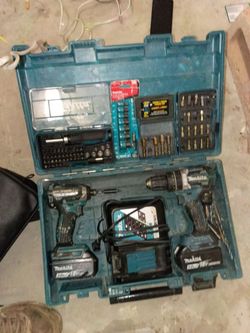 Makita drill combo set w/ 2 batteries and a charger / new socket set and new driver set