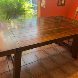 Dining room table solid wood great condition . Rectangle with 4 chairs