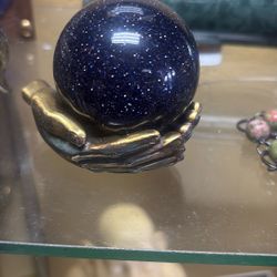 Mystical hand and ball