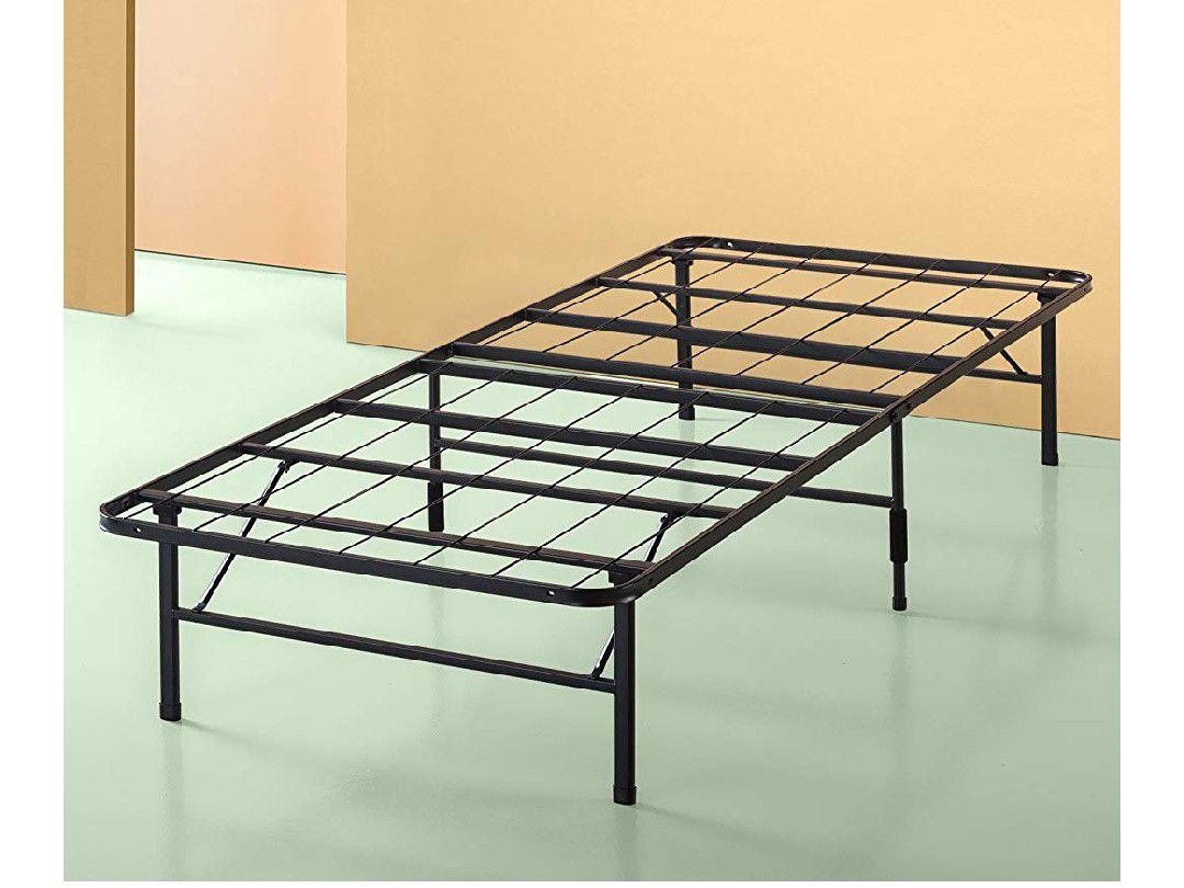 Brand new zinus twin elevated bed frame. 14 inches high. Easily store things underneath