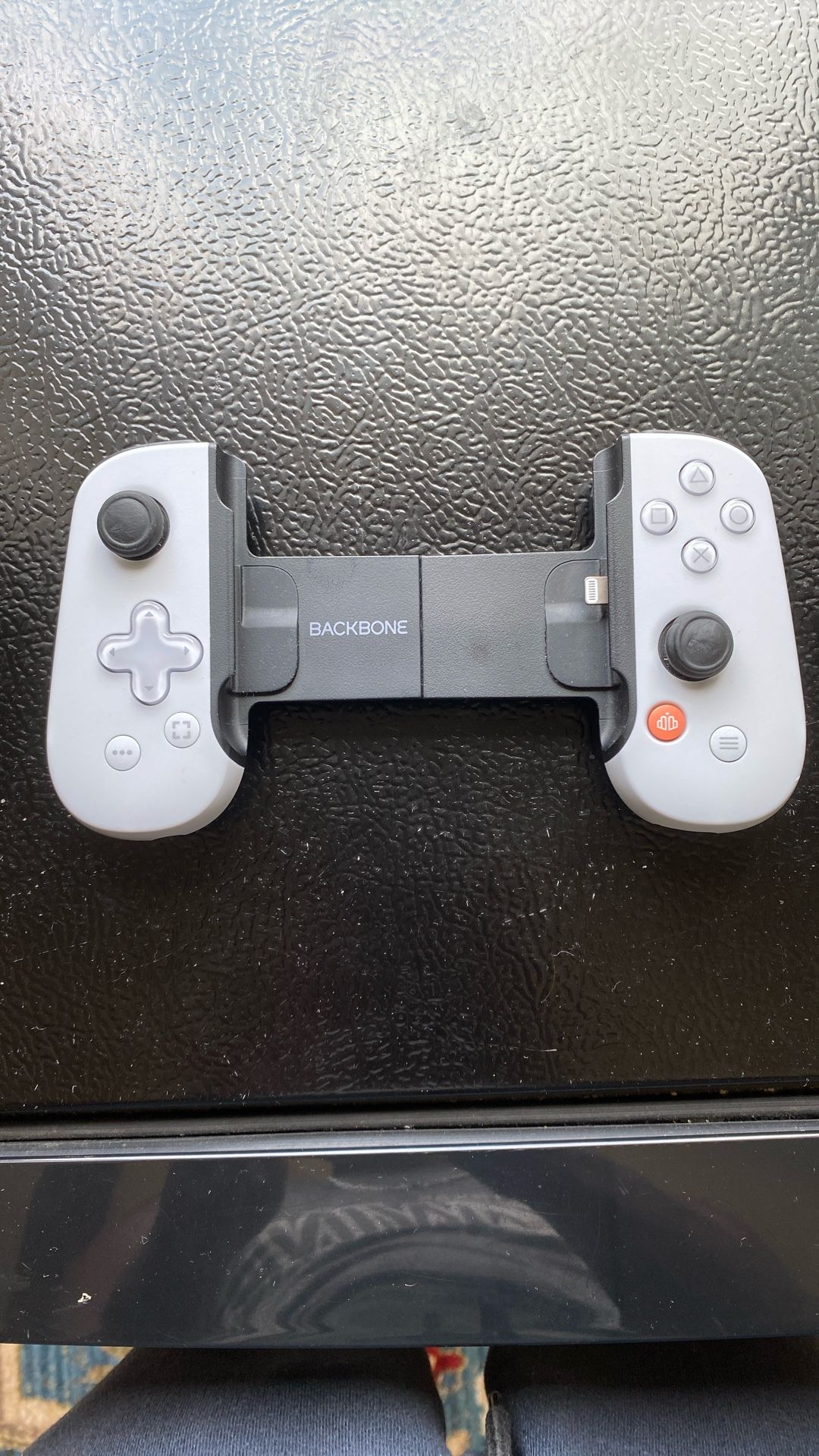 Grey and Black Backbone Controller