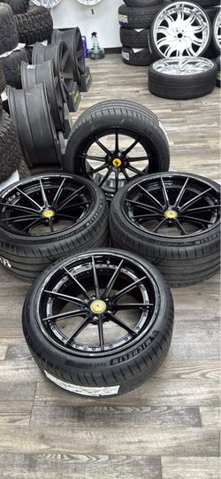 4 wheels and tires mounted. 20/21” 2 piece Ferarri wheels w 265/35/20 front and 325/25/21 rear (NEW)