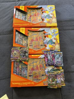 Restrain & charizard Gx Premium Collection  $275 Ea Box