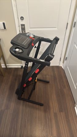 Black and red, 42 in tall when folded, 24 inches wide. Treadmill is 34 lbs