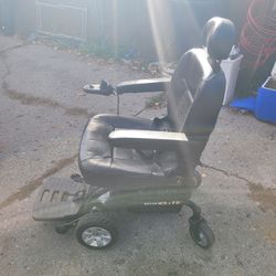 Electric Scooter Chair With Batteries And Charger.