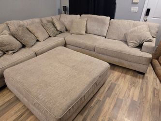 Large Beige Sectional Sofa with Ottoman