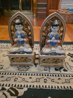 Pair of Porcelain Buddhist Deity Figurines