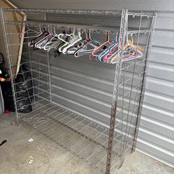 Large heavy-duty metal garment rack with shoe shelf