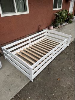 Twin size white frame mattress support platform