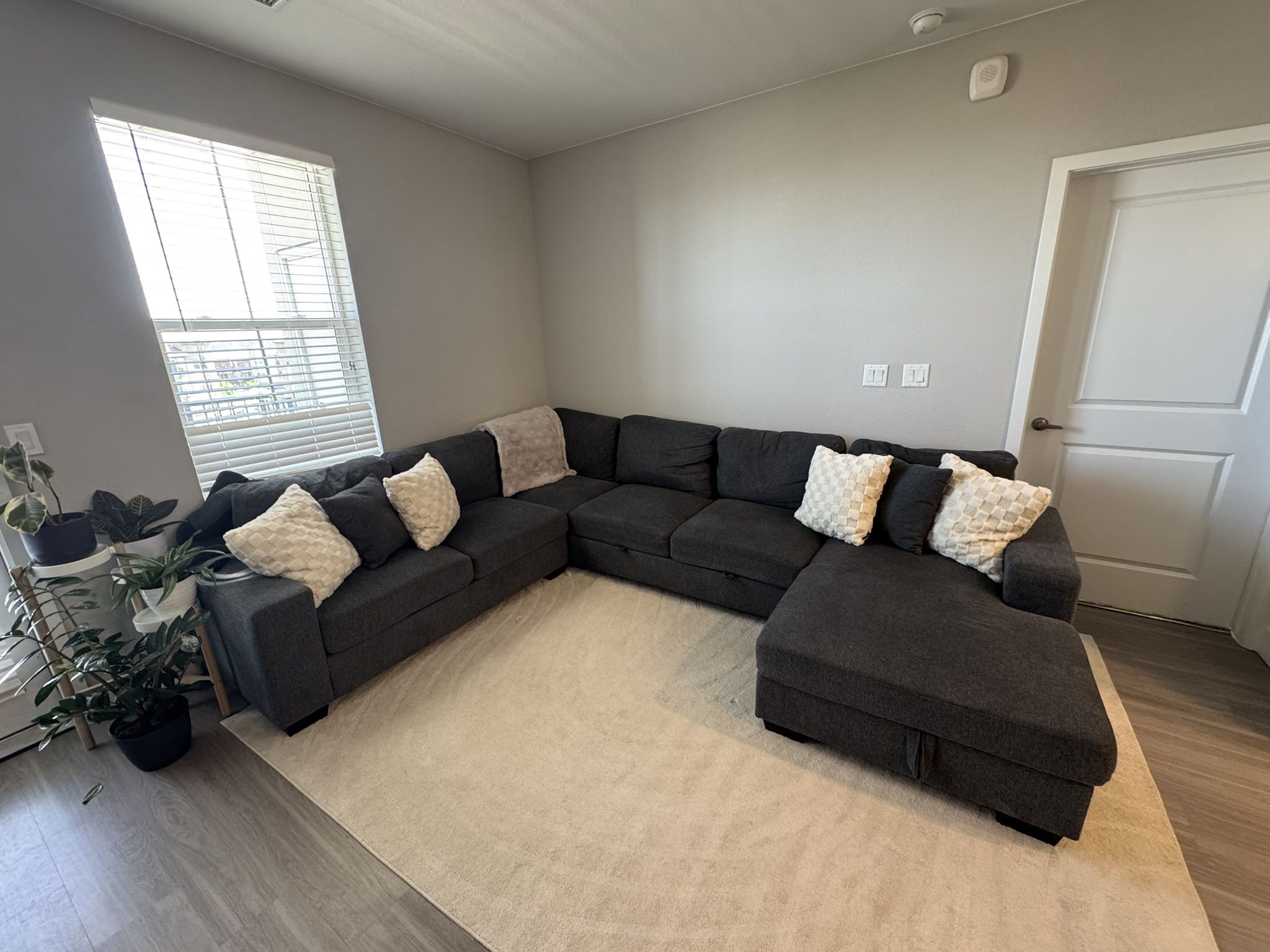 Right facing 4 piece sleeper sectional couch