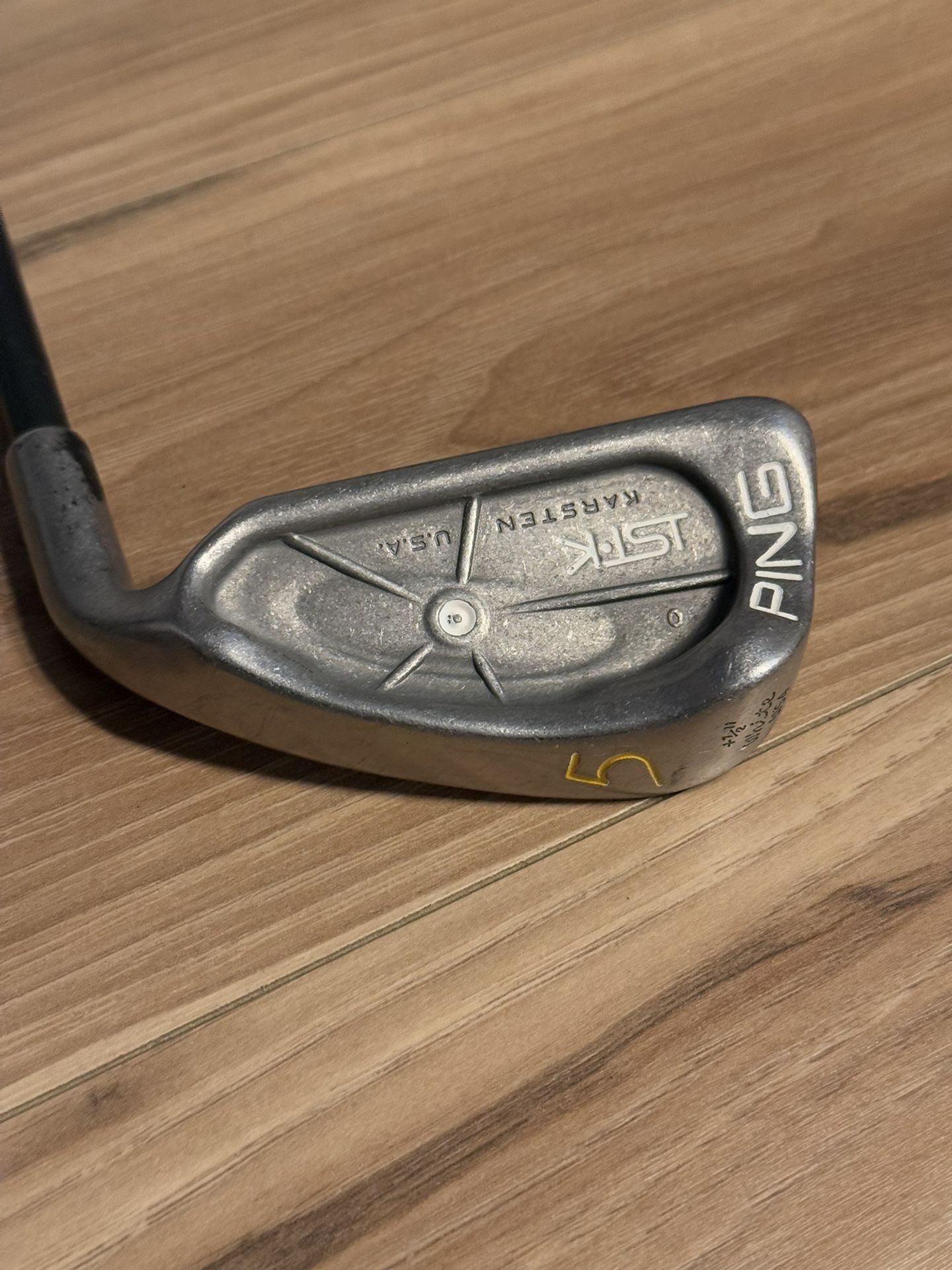 High quality Ping golf iron. Sleek silver finish. Perfect for golf enthusiasts. Enhance your golf game. Features a sleek design and vibrant color. Pin