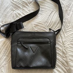 GUESS Black Logo Embossed Crossbody Bag Adjustable Strap Zip Pocket
