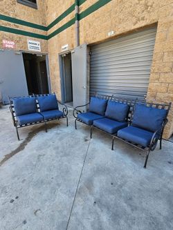 Beautiful pair of Aluminum Patio Fire Table Set Blue Cushions sofa