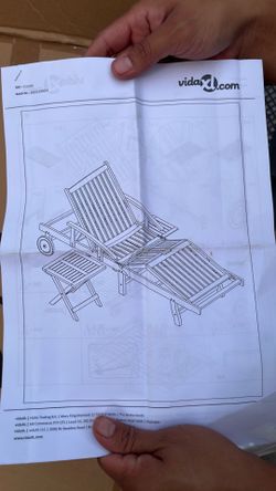 Silla para el sol de madera nueva en su caja