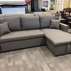 Grey Sectional With  Pull- Out Bed & Storage 
