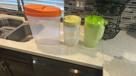 Large Cereal container and Two water Pitchers