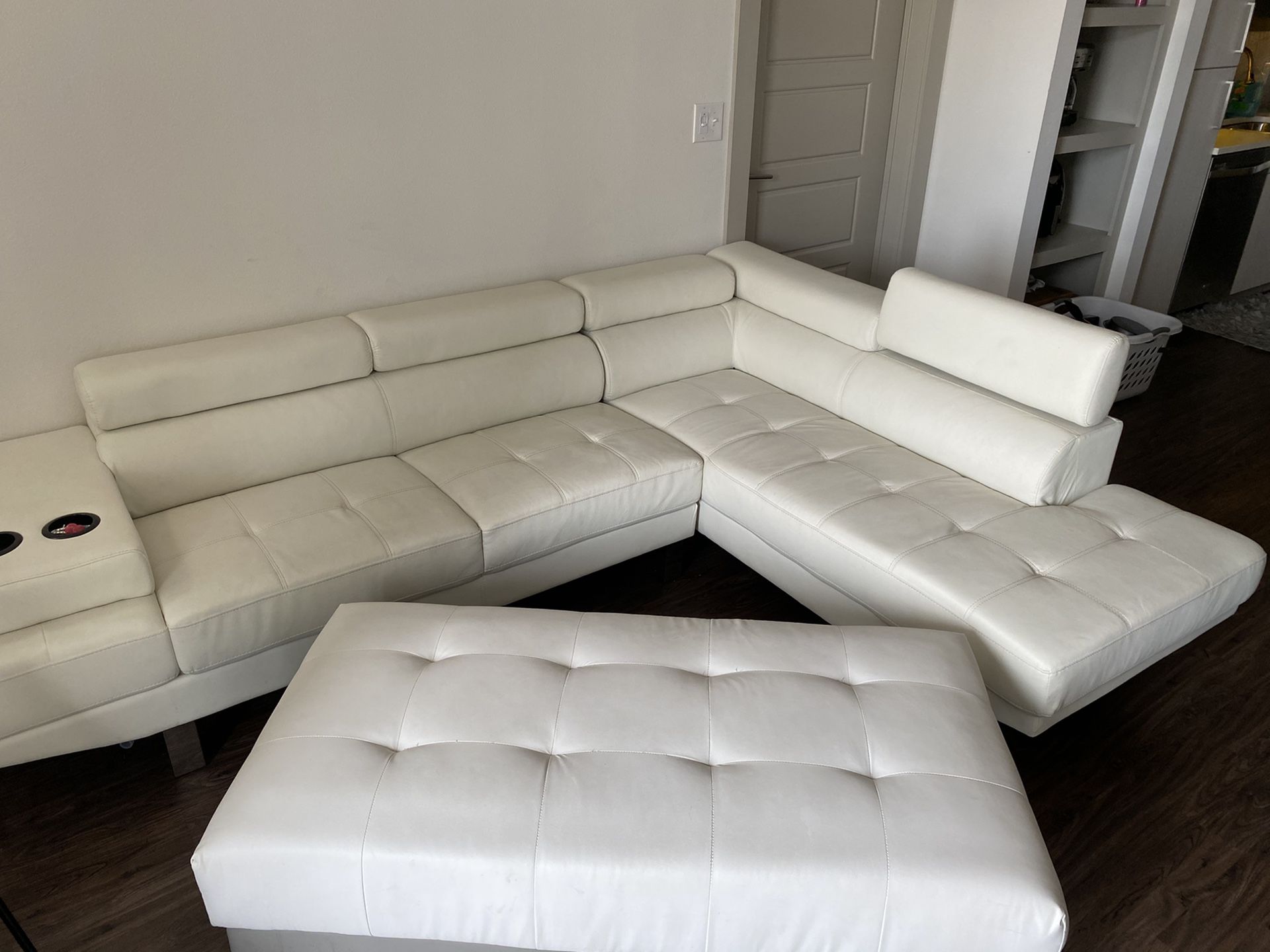 White Sectional Couch and ottoman