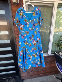 Blue floral Calvin Klein  ruffle hem size 12/14