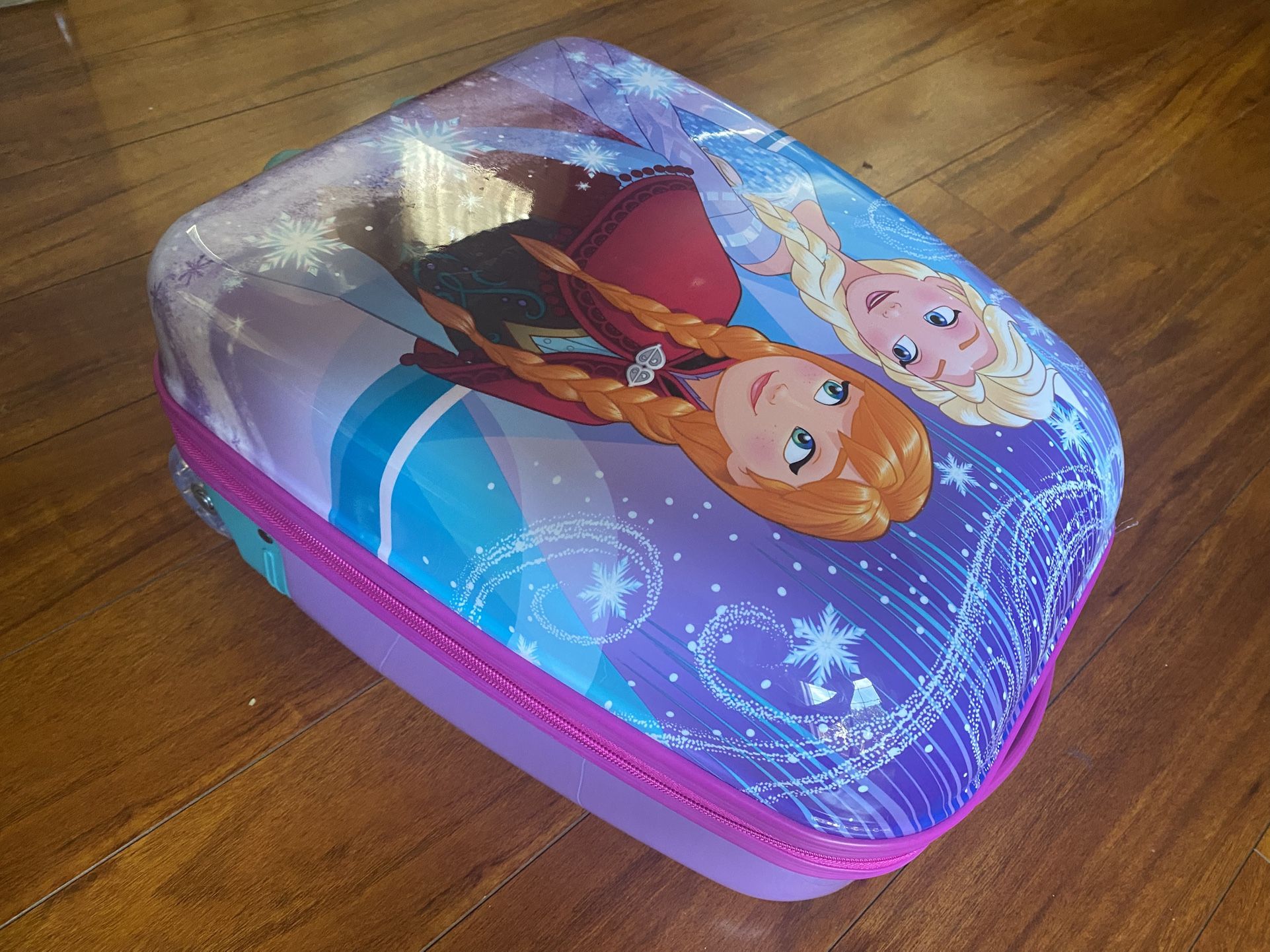 disney's frozen 2 anna and elsa 18-inch hardside wheeled carry-on luggage by american tourister