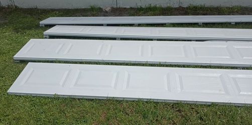 16ft 7ft garage door used but still awesome shape only 3 years old