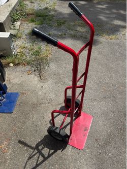 Red hand dolly truck w/ airless tires