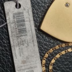 Tory Burch Heart Locket Opens New 
