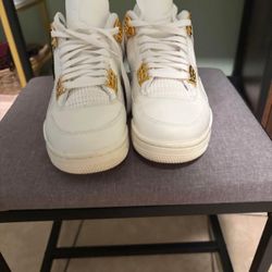 metallic jordan 4s 