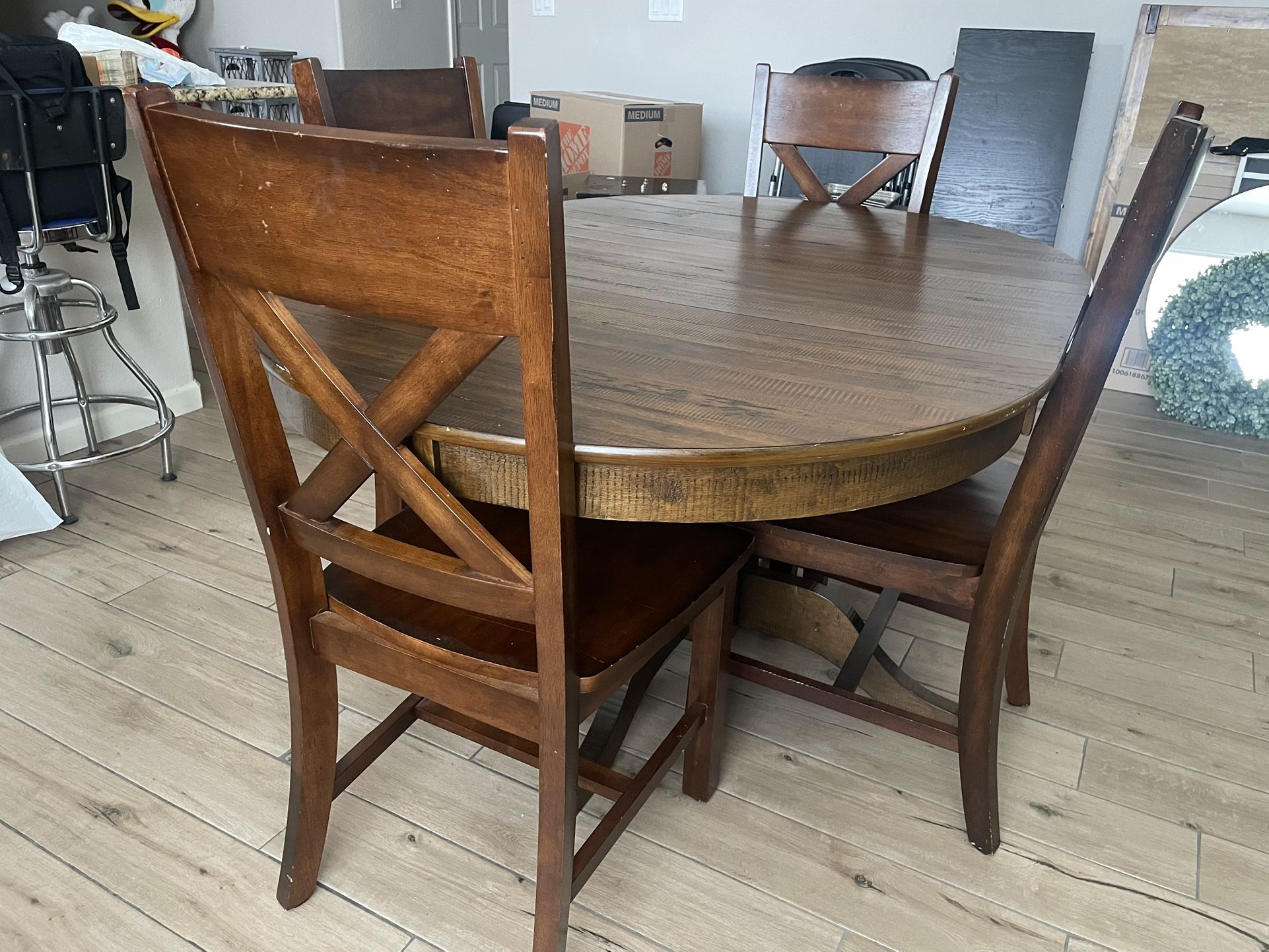 $400 Table + 4 Chairs 