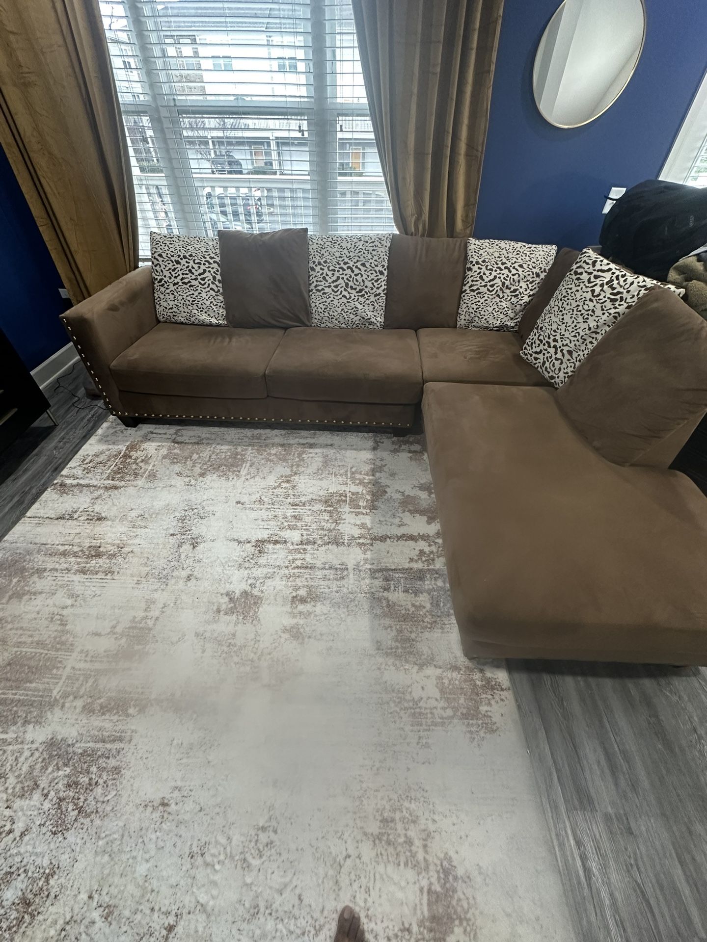 Brown Sectional Sofa with Chaise and Decorative Cushions