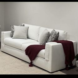White sofa from Living Spaces, originally $1,100 — selling for $350.
