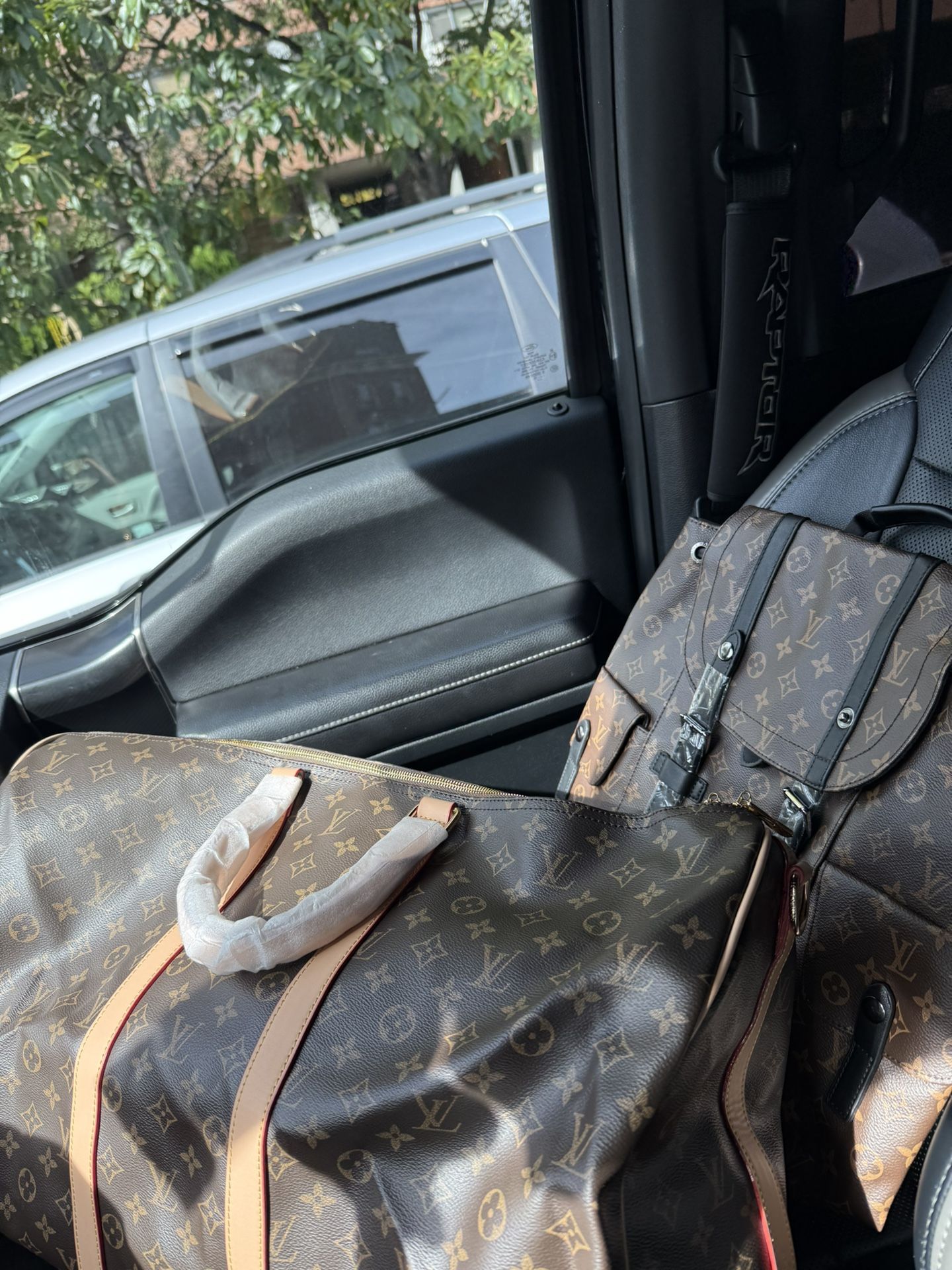 LV Duffle Bag And LV Book bag