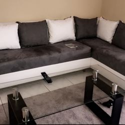 2 piece sectional with glass table