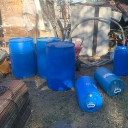 Big and small plastic water jugs