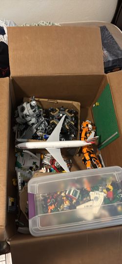 box of various toys and legos