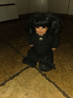 Porcelain indian doll