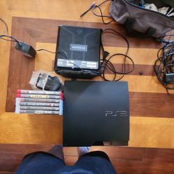PS3 Plus Games And Router/ Modem