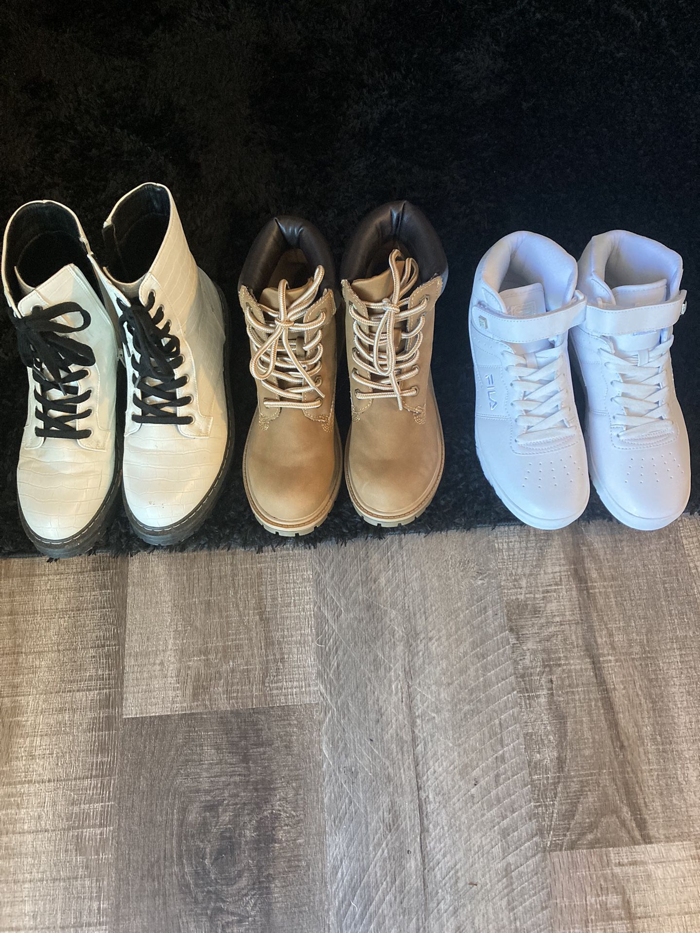 Three Pairs Of Flawless Combat Boots And Fila Sneakers In Willoughby Ohio. $50 takes all three pairs! Brand new!