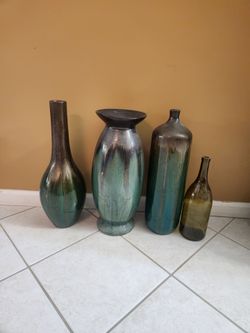 Green and brown decorative vases