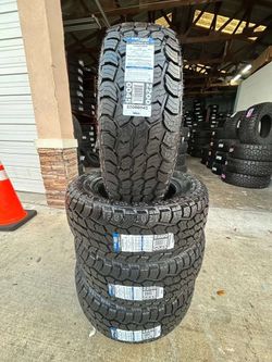 Set of four (4) Celimo A/T tires with free install Mount & balance 265-65-18