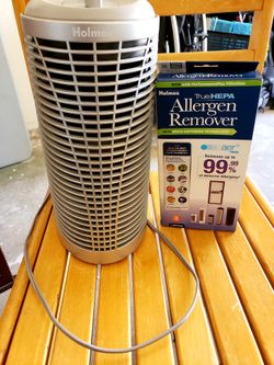 Holmes air purifier with a new box of filter refills.
