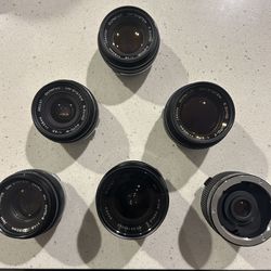 Olympus OM-System Lens Lot – 4 Zuiko Primes + Vivitar 24mm + Matched Multiplier